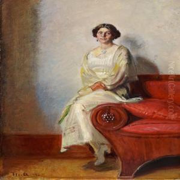 Portrait Of Henny Brodersen Seated On A Sofa Armrest Oil Painting by Michael Ancher