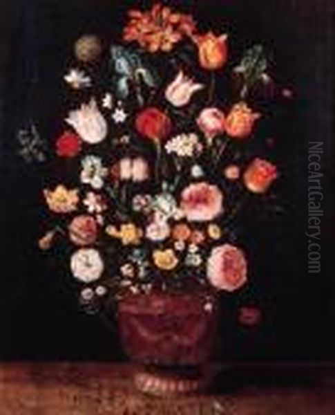 Roses, Tulips, Lilies, Carnations And Other Flowers In A Sculptedvase On A Wooden Ledge Oil Painting by Jan The Elder Brueghel