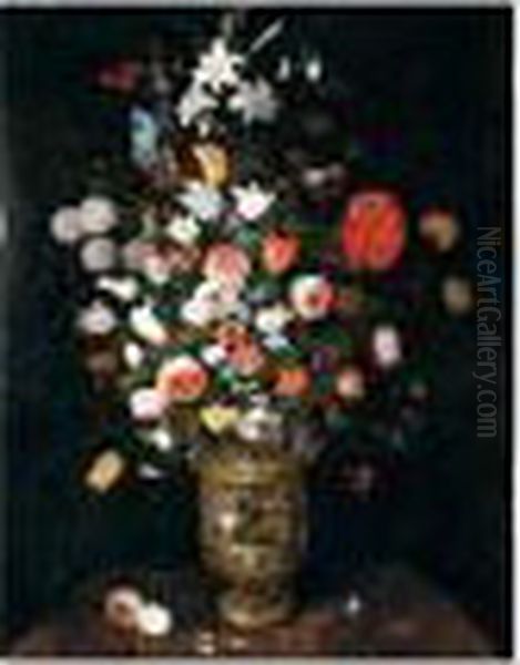 Still Life Of Roses, Daffodils, 
Carnations, Snake-head Fritillaries, Irises And Lilies In A Sculpted 
Parcel-gilt Vase, Upon A Stone Ledge Oil Painting by Jan Brueghel the Younger