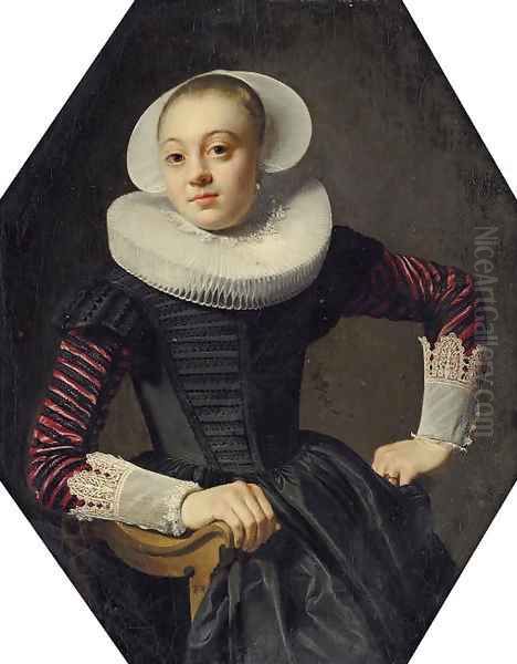 Portrait of a lady, seated three-quarter-length, in a black dress with red slashed sleeves, lace cuffs and a ruff Oil Painting by Thomas De Keyser