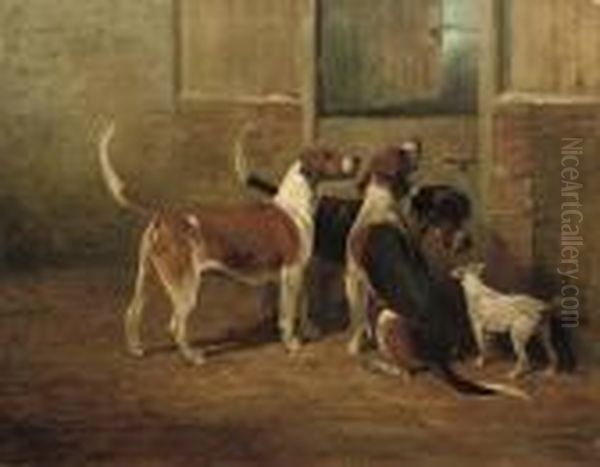 Foxhounds And A Lakeland Terrier By A Stable Door Oil Painting by John Emms