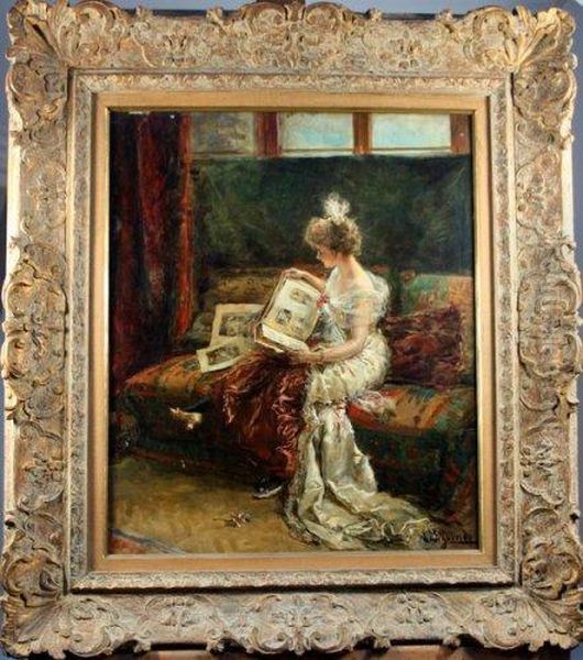 Jeune Femme Regardant Un Album Oil Painting by Eduardo Leon Garrido