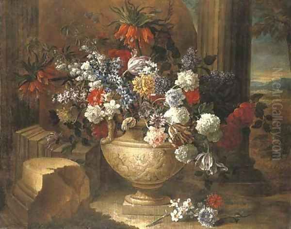 Tulips, lilacs, dahlias and other flowers in a sculpted vase, before a column, a landscape beyond Oil Painting by Jean-Baptiste Monnoyer