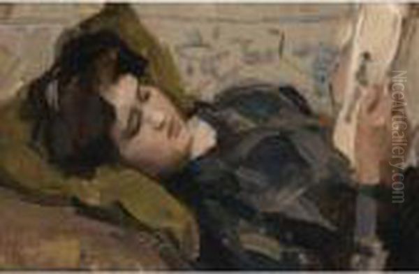 A Reclining Girl Looking At A Print Oil Painting by Isaac Israels