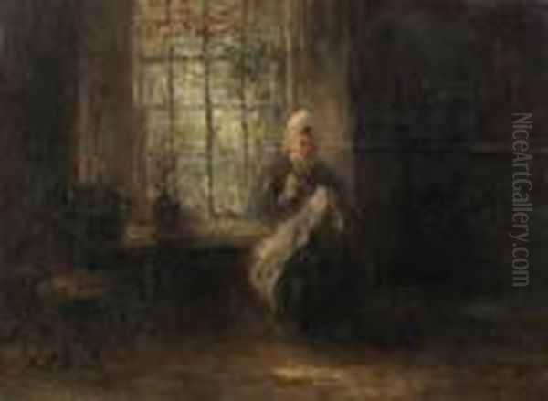 A Woman In An Interior Oil Painting by Jozef Israels