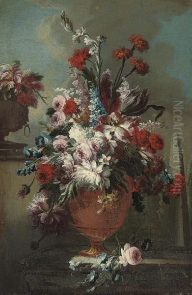 Roses, Carnations, Marigolds, 
Narcissi, Chrysanthemums And Otherflowers, In An Urn On A Ledge, An 
Obelisk Beyond Oil Painting by Gasparo Lopez