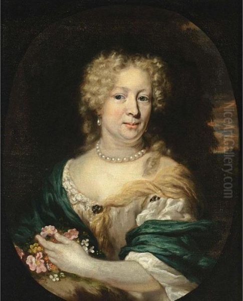 A Portrait Of A Lady, Bust 
Length, Wearing A White Satin Dress With A Green And Yellow Shawl, Pearl
 Necklace And Earrings And Holding Flowers In Her Left Hand, In A Park 
Landscape, In A Painted Oval Oil Painting by Nicolaes Maes