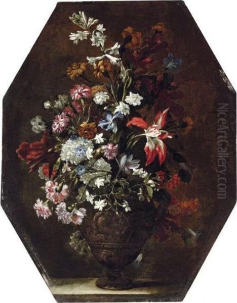 A Lily, An Iris, Carnations, Chrysanthemums And Other Flowers In Abronze Relief Urn Oil Painting by Mario Nuzzi Mario Dei Fiori