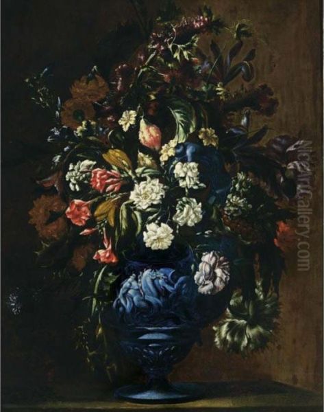 A Still Life With Roses, 
Carnations, Poppy Anemones, Cornflowers, Irises, Lilies And Other 
Flowers In A Blue Sculpted Stone Vase Oil Painting by Mario Nuzzi Mario Dei Fiori