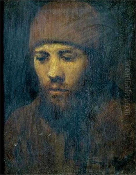 Portrait Of A Bearded Young Man Wearing A Cap Oil Painting by Rembrandt Van Rijn