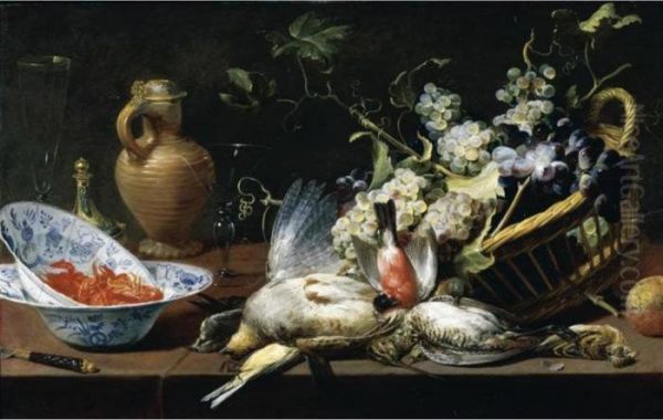 A Still Life Of A Basket Of 
Grapes, Birds, Including A Partridge, Snipe, Sparrow And Finch, Two 
Blue-and-white Oil Painting by Frans Snyders