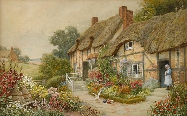 An English Country Garden With A Girl Outside A Thatched Cottage Oil Painting by Arthur Claude Strachan