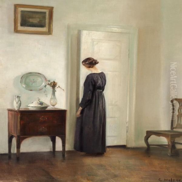 Interior With A Woman Inblack Opening A White Painted Door Oil Painting by Carl Vilhelm Holsoe