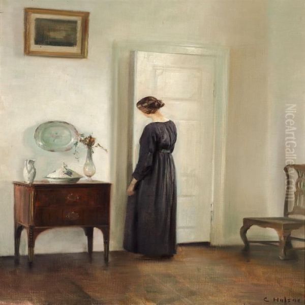 Interior With A Woman Opening A White Painted Door Oil Painting by Carl Vilhelm Holsoe