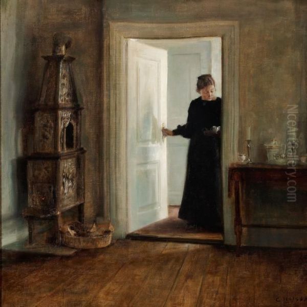 Interior With A Woman Carrying A Tray Though A Sun Lit Doorway Oil Painting by Carl Vilhelm Holsoe