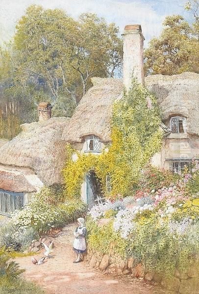 A Thatched Cottage With A Girl Feeding Pigeons By A Flower Bed In The Foreground Oil Painting by Arthur Claude Strachan