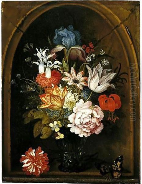 A Still Life Of Tulips, A Rose, An Iris, A Fuchsia, Forget-Me-Nots And Other Flowers In A Berkemeijer Glass, Set In A Niche And Flanked With A Carnation And A Butterfly Oil Painting by Balthasar Van Der Ast