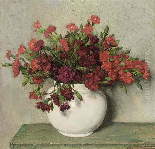 A Still Life With Red Carnations In A Vase Oil Painting by Johannes Evert Hendrik Akkeringa