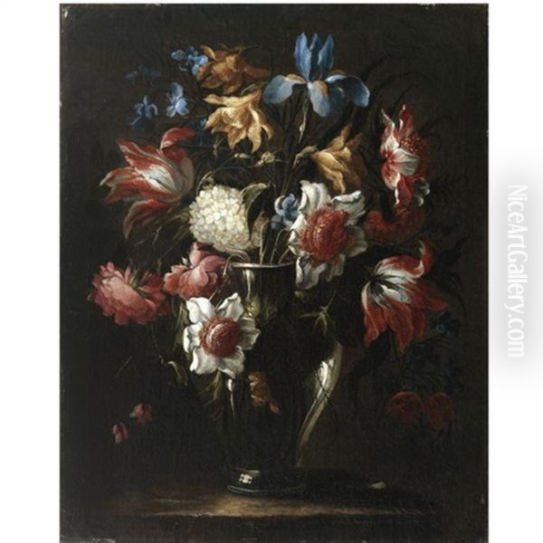 Still Life With Flowers In A Glass Vase, Including Blue Irises And Parrot Tulips, Arranged On A Stone Ledge Oil Painting by Juan De Arellano