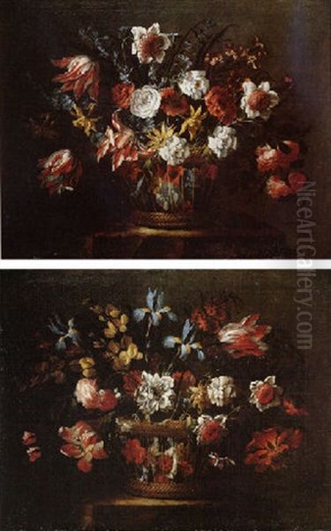 Still Life Of Chrysanthemums, Variegated Tulips, Narcissi, Hyacinths, Roses, Irises And Stocks, Arranged In A Wicker Basket, Upon A Stone Ledge Oil Painting by Juan De Arellano