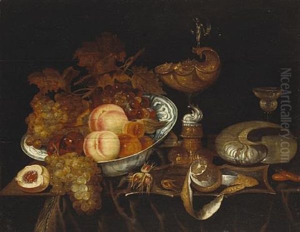 A Still Life Of Fruit In A Blue And White Bowl, A Ewer, A Goblet, A Partially-peeled Lemon And A Nautilus Shell, All Resting On A Partially Draped Table Oil Painting by Bartholomeus Assteyn