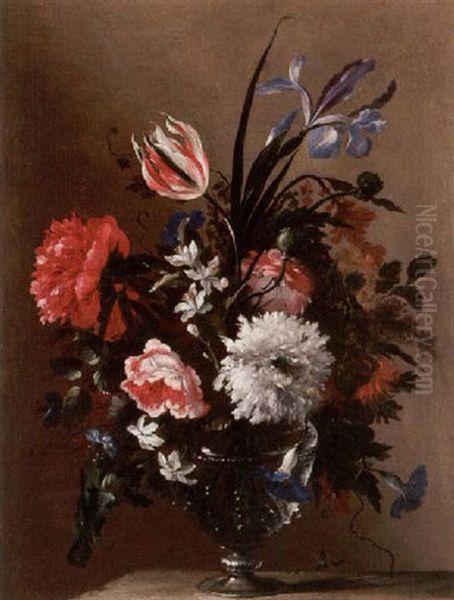 A Still Life Of An Iris, A Rose, A Tulip, Peonies And Other Flowers In A Glass Vase On A Stone Ledge Oil Painting by Nicolas Baudesson