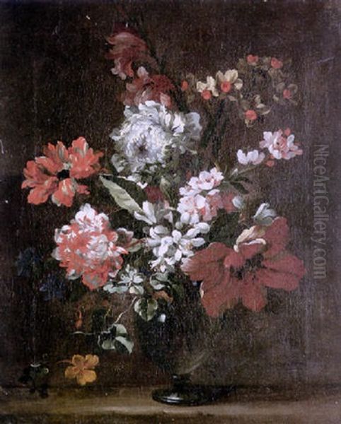 A Still Life Of Narcissi, Apple Blossom, Tulips And Other Flowers In A Glass Vase On A Stone Ledge by Nicolas Baudesson