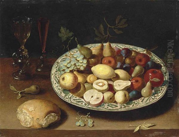 Pears, Grapes, Lemons, Apples And Other Fruit In A Ceramic Bowl, With Facon-de-venise Glasses Filled With Wine And Bread On A Ledge Oil Painting by Osias Beert the Elder