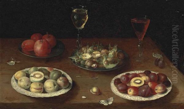 Hazelnuts And Walnuts, And Apples On Pewter Platters, Plums And Nectarines On Porcelain Plates, With Glasses Of Red And White Wine, And A Butterfly, On A Wooden Table by Osias Beert the Elder