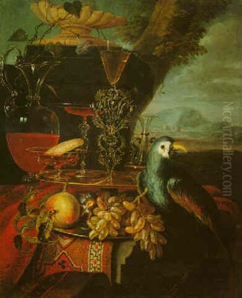 A Still Life With Glasses, A Parrot, Grapes And A Peach On A Pewter Plate On A Draped Table In A Landscape Oil Painting by Christian Berentz