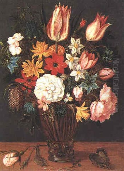 A Still Life Of Tulips, Roses, Anemones, Aquilegia, Love-in-the-mist, Rosemary, Narcissi, A Fritillary And Other Flowers In A Glass Vase Beside A Rose Stem On A Table Oil Painting by Pieter Binoit