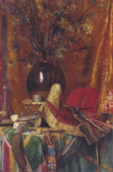 A Vase Of Peacock Feathers, Assorted Swords, A Pistol, A Saddle, And Other Orientalist Objects On A Table Oil Painting by Maurice Bompard