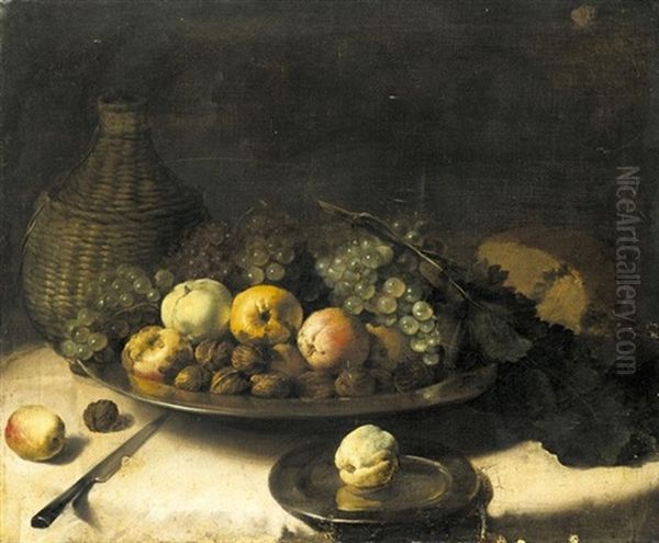 A Still Life With Fruit And Walnuts In A Silver Bowl, A Cask Of Wine, A Knife And Other Objects Laid Out On A Draped Table Oil Painting by Pieter Van Boucle