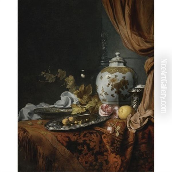 A Blue And White Faceted Vase, A Rose And Walnuts On A Pewter Plate, A Wan-li Kraak Porcelain Bowl, A Silver Wine Cooler, A Wineglass, A Glass, A Lemon And Roses On A Table Draped With A Carpet Oil Painting by Joseph de Bray