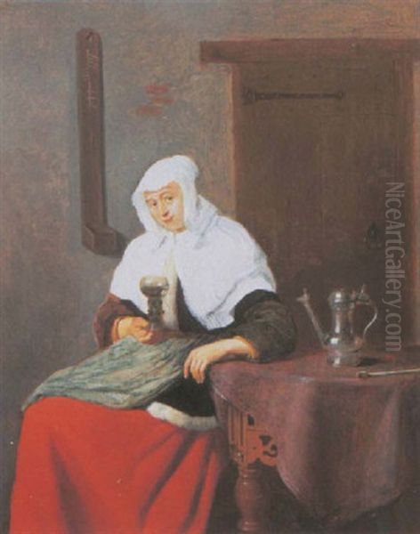 A Woman Seated In An Interior Holding A Roemer Oil Painting by Quiringh Gerritsz van Brekelenkam