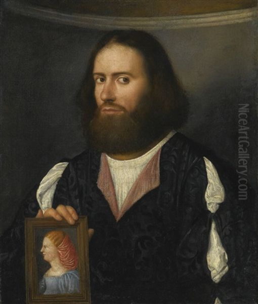 Portrait Of A Gentleman, Half Length, Holding A Portrait Of A Lady Oil Painting by Giovanni Cariani