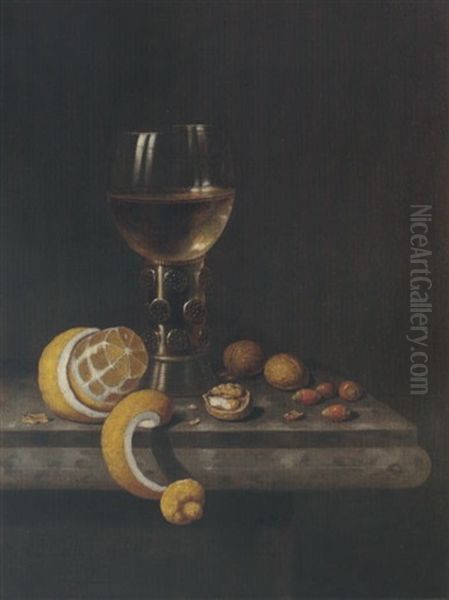 A Still Life Of A Roemer, Peeled Lemon, Walnuts And Hazelnuts Upon A Stone Ledge Oil Painting by Edward Collier