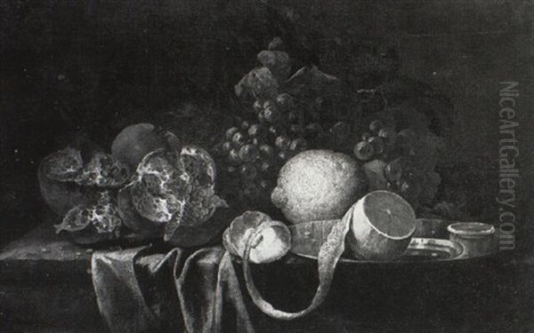 A Lemon On A Silver Plate With Pomegranates And Grapes On A Draped Table Oil Painting by Alexander Coosemans