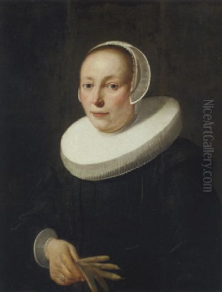 Portrait Of A Lady In A Black Dress And Molenkraag, A White Bonnet And Lace Cuffs, A Pair Of Gloves In Her Hand Oil Painting by Jacob Gerritsz Cuyp