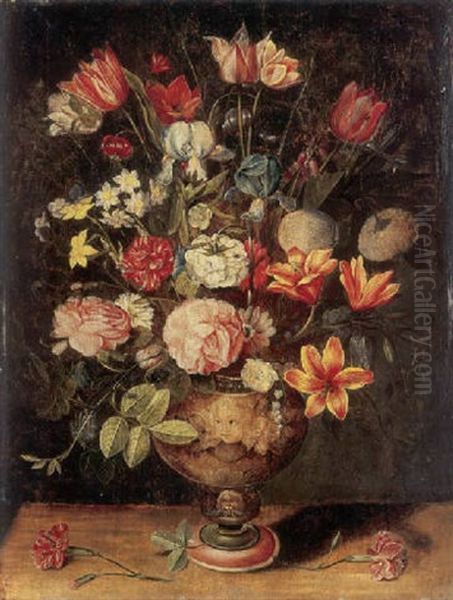 Tulips, Irises, Roses, Carnations, Lilies, Narcissi And Other Flowers In A Sculpted Urn On A Table Oil Painting by Andries Daniels