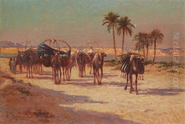 Caravane Longeant Un Oued Oil Painting by Alexis Auguste Delahogue