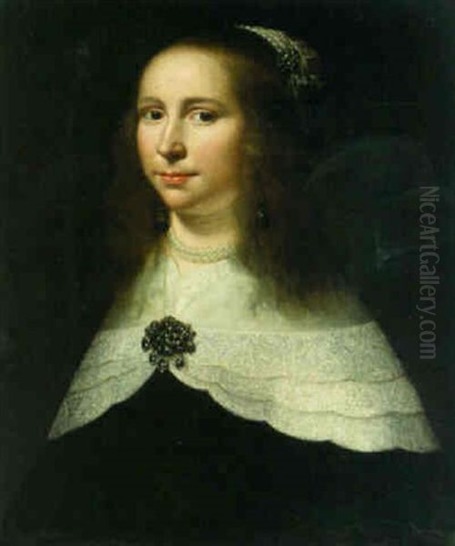 Portrait Of A Lady, Bust-length, In A Black Dress With A White Lawn Collar And A Brooch Oil Painting by Jacob Willemsz Delff the Younger