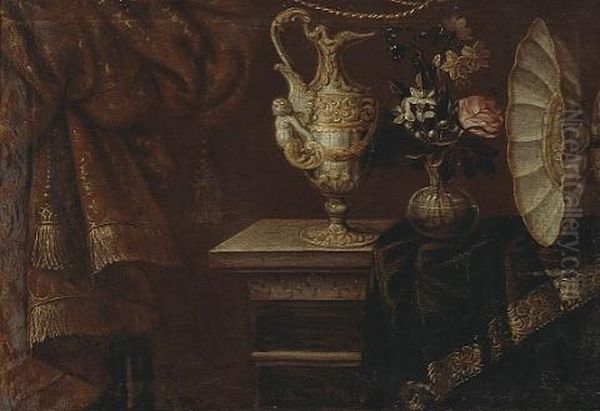 A Still Life With An Ewer, Footed Basin And Flowers In A Glass Vase On A Partially Draped Table Oil Painting by Antonio Gianlisi