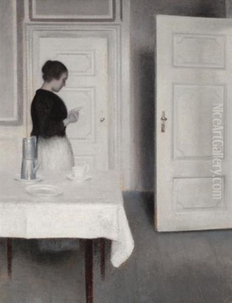 Ida Reading A Letter Oil Painting by Vilhelm Hammershoi