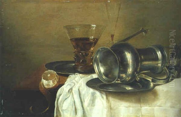 An Overturned Pewter Ewer On A Plate, A Wineglass, And A Peeled Lemon On A Partly Draped Table Oil Painting by Gerrit Willemsz. Heda