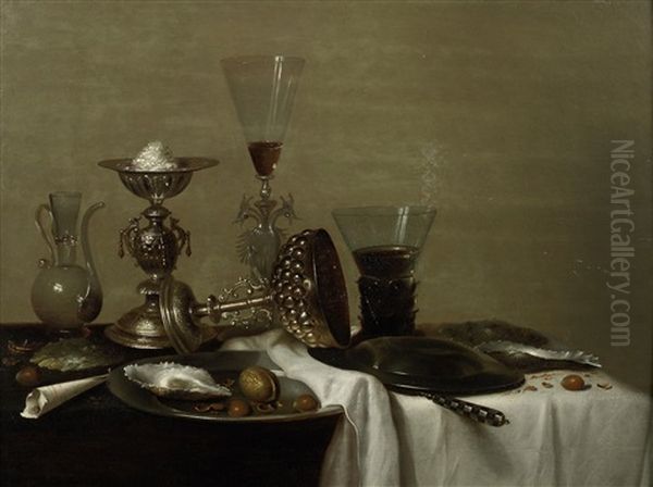 A Silver Cup With A Roemer Of White Wine And A Glass Jug On A Draped Table With A Pewter Dish Of Oysters And Nuts Oil Painting by Willem Claesz Heda