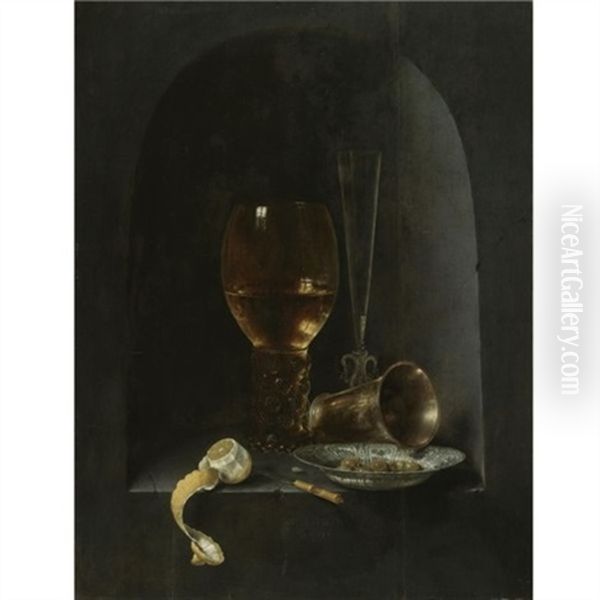 Still Life With A Roemer, A Fluted Wine-glass, A Silver Goblet, A Blue-and-white Porcelain Bowl Filled With Green Olives, A Partly Peeled Lemon And A Knife, All Arranged Within A Stone Niche by Willem Claesz Heda