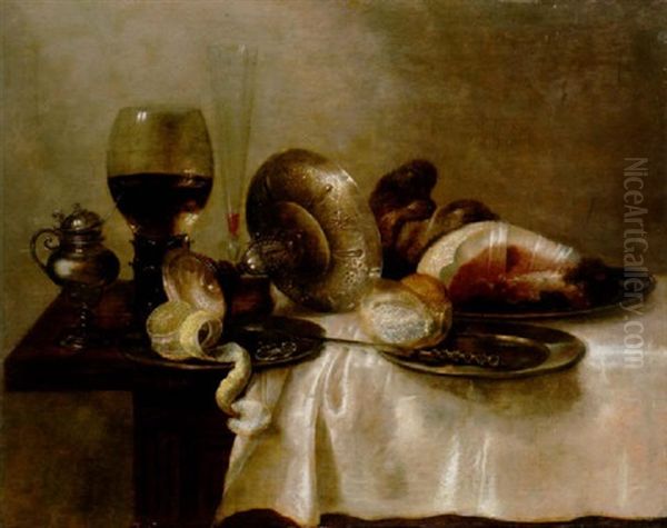 A Half-filled Roemer, A Glass, An Overturned Silver Tazza, A Salt Cellar, A Ham, Bread And Peeled Lemon On Pewter Dishes, On A Table Oil Painting by Willem Claesz Heda