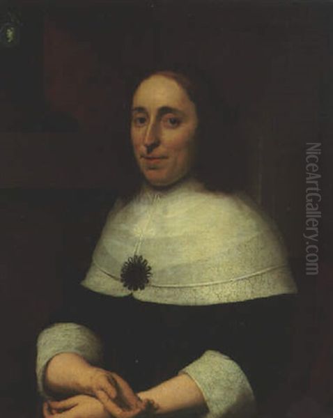 Portrait Of A Lady, Seated Half-length, In A Black Dress On A Terrace, A Cameo On A Column Above Oil Painting by Bartholomeus Van Der Helst