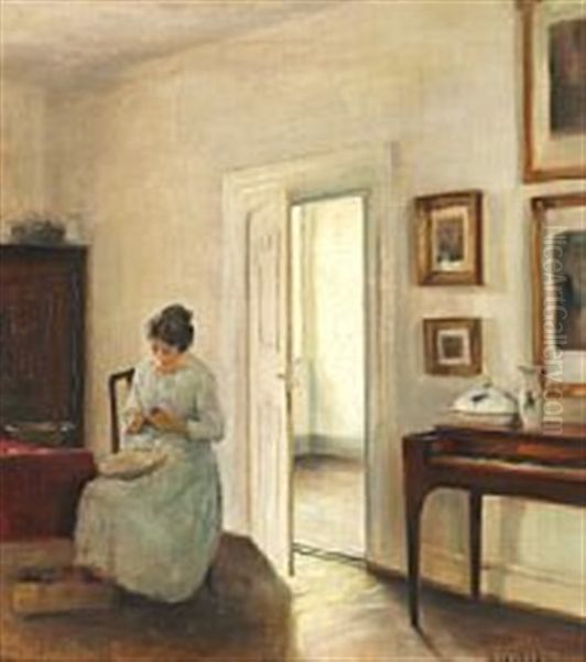 Interior With A Young Woman Peeling Fruit Oil Painting by Carl Vilhelm Holsoe